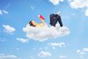 23578981-young-relaxed-female-reading-a-novel-and-lying-on-clouds.jpg